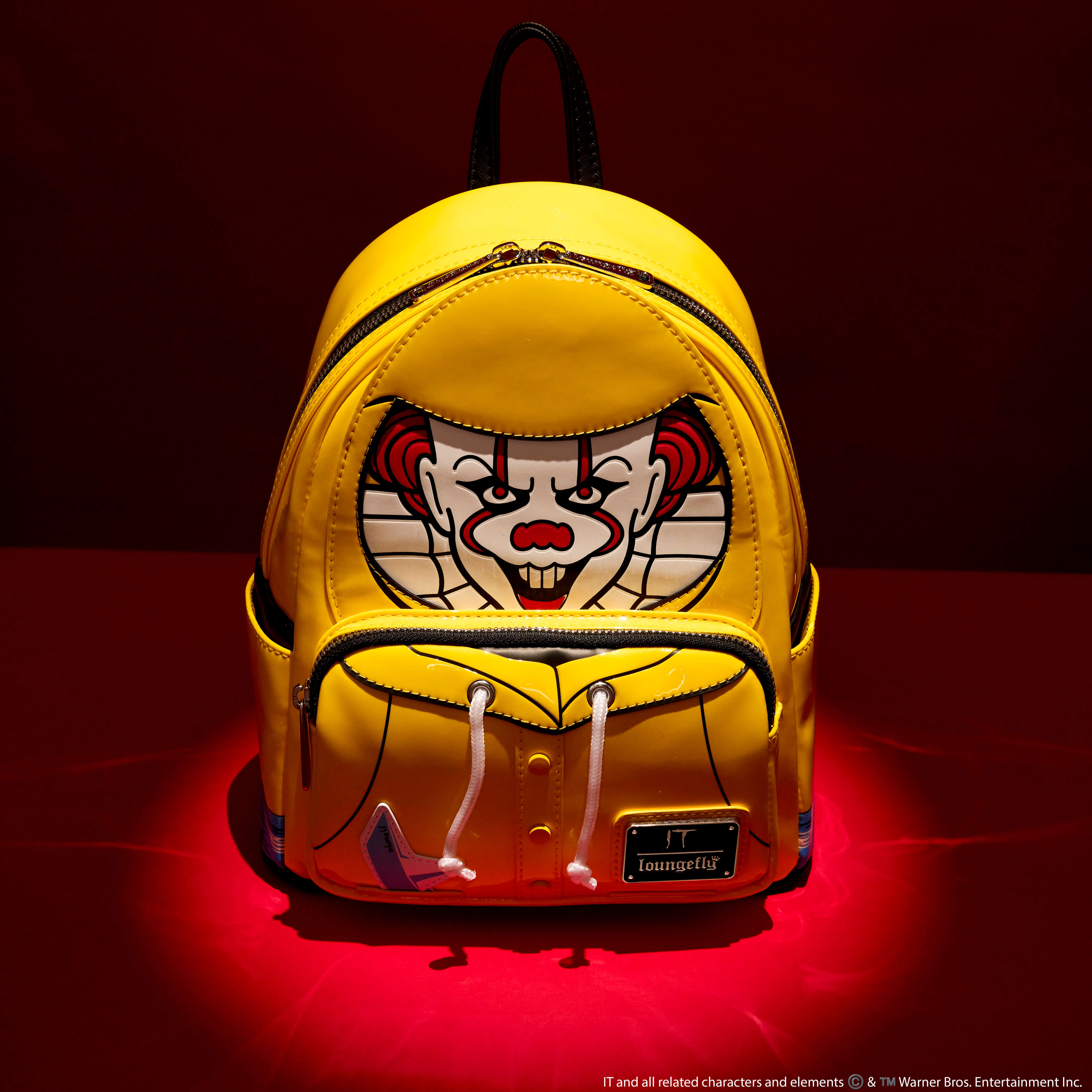 Buy It Pennywise Raincoat Cosplay Glow Mini Backpack at Loungefly