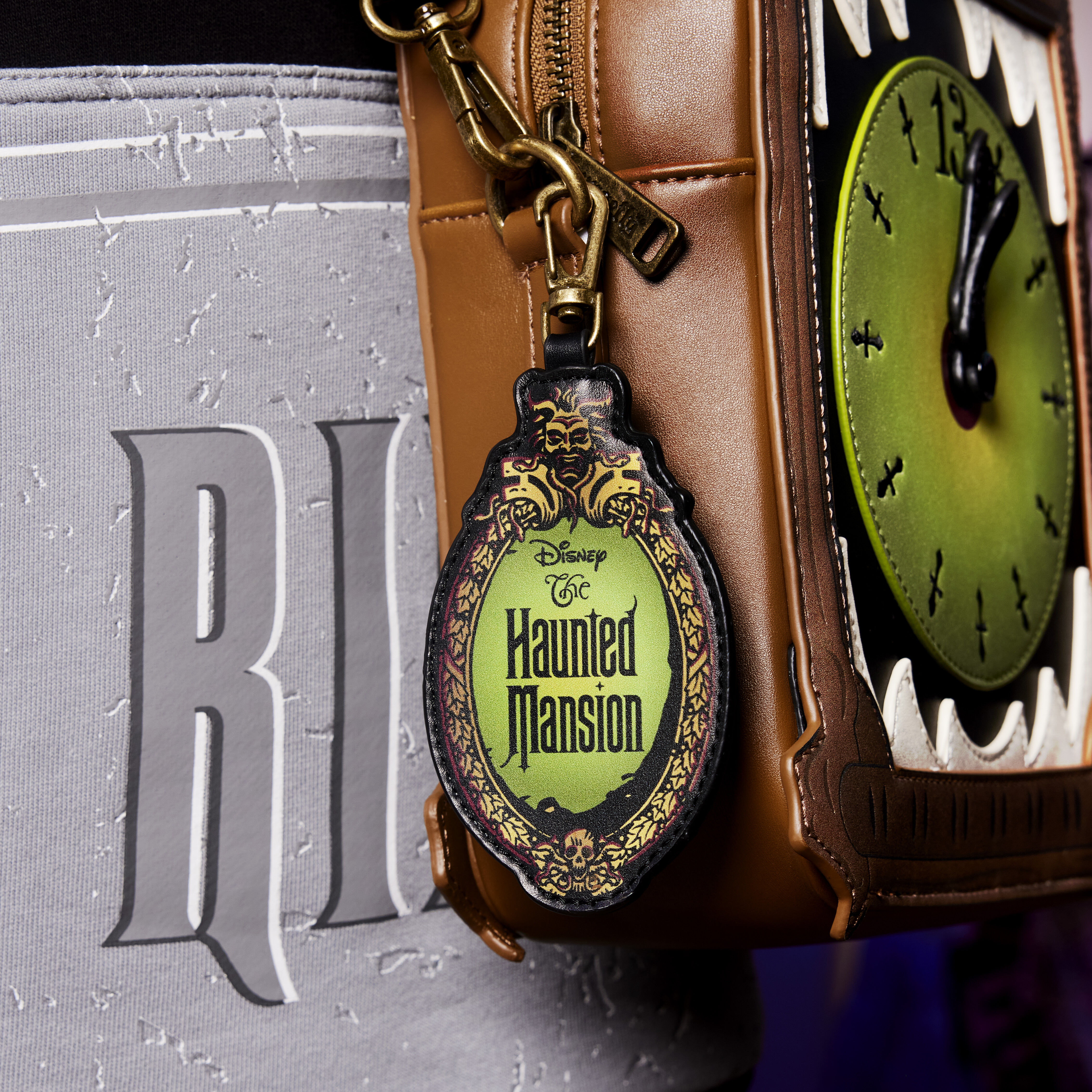 Buy Haunted Mansion Grandfather Clock Glow Crossbody Bag at Loungefly
