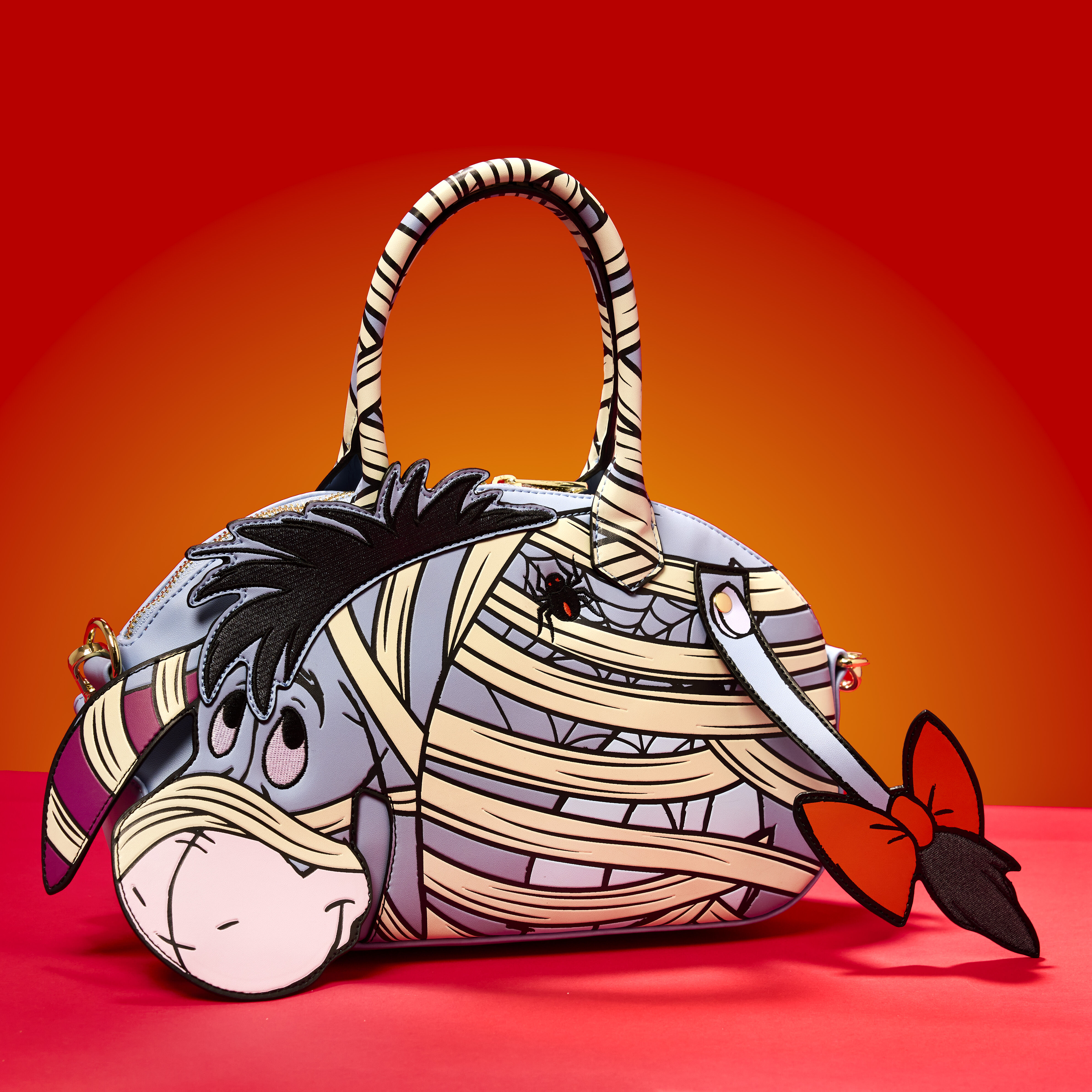 Buy Winnie The Pooh Mummy Eeyore Cosplay Glow Crossbody Bag at Loungefly