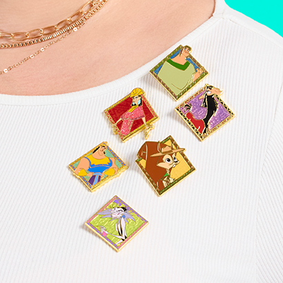 close up of Emperor's New Groove mystery pins