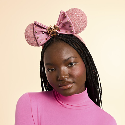 Model wearing pink Minnie Ears Headband