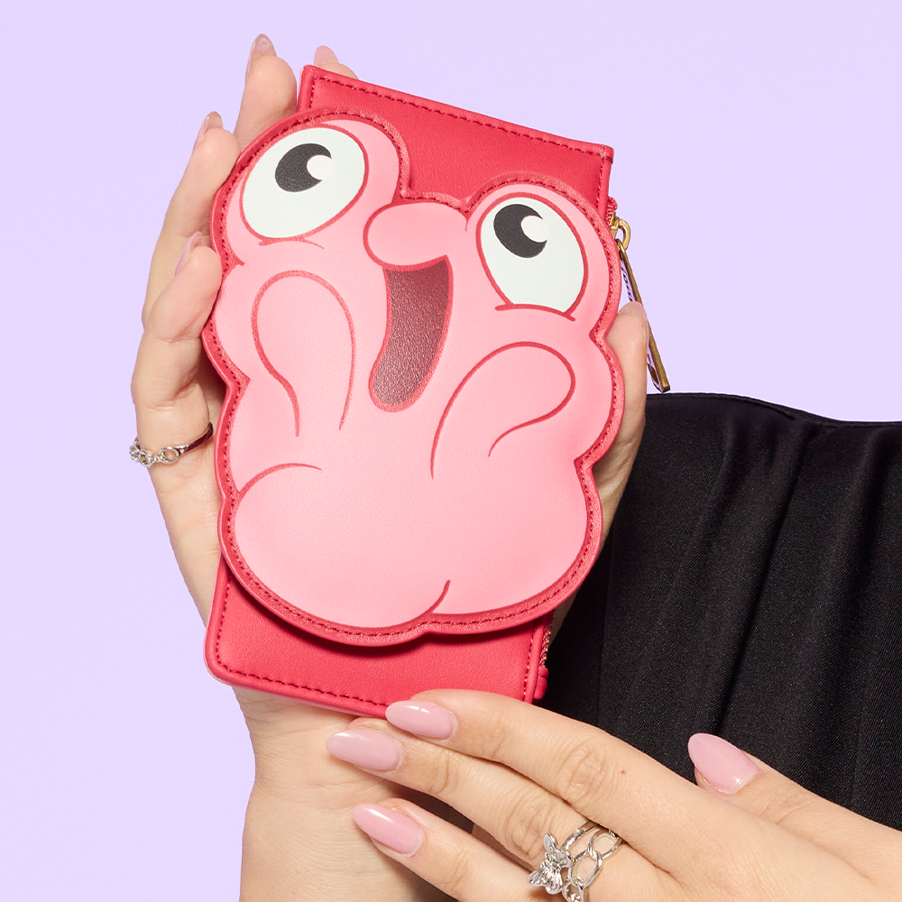 Close up of model holding Morph Treasure Planet Wallet