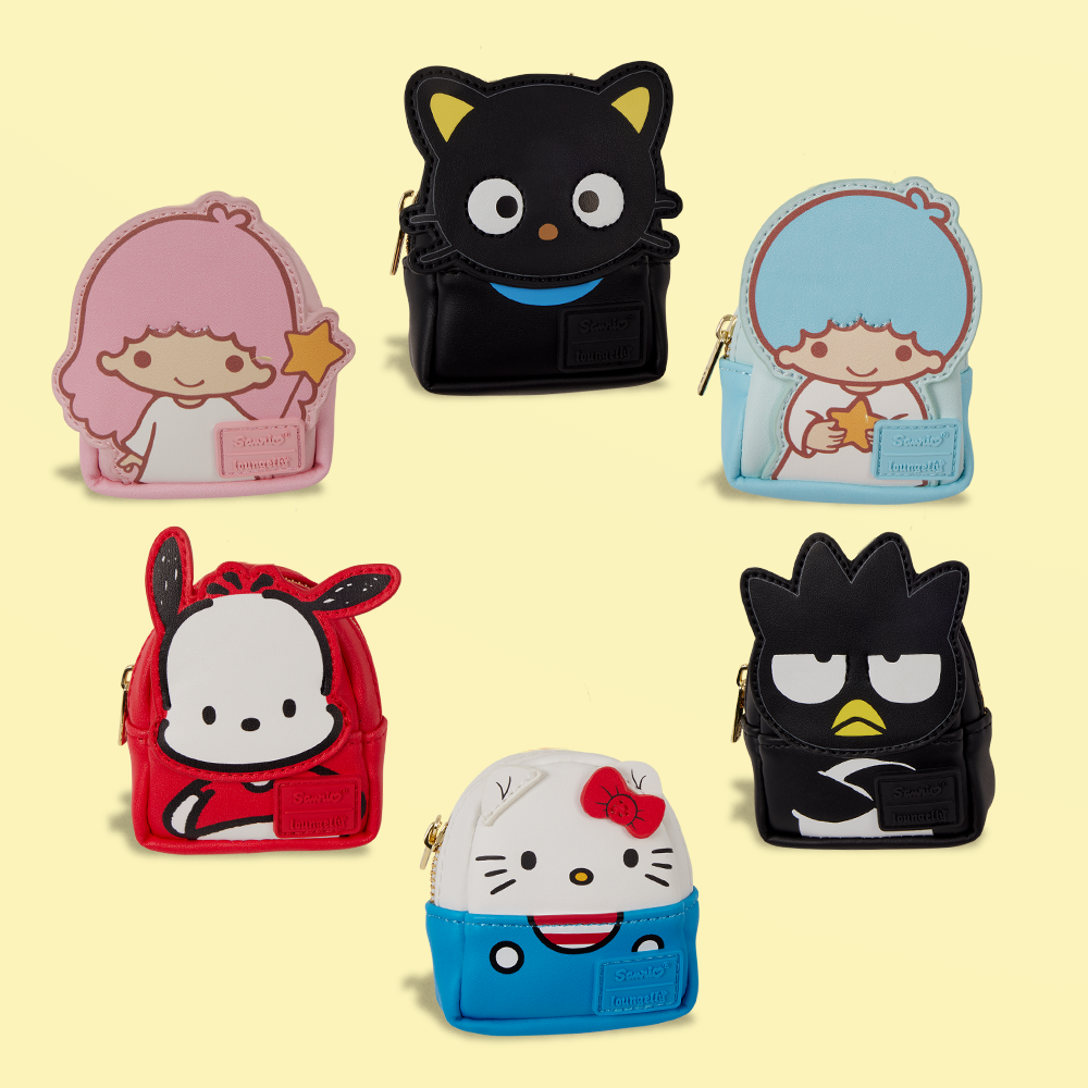Pale yellow background with selection of Sanrio keychain bags