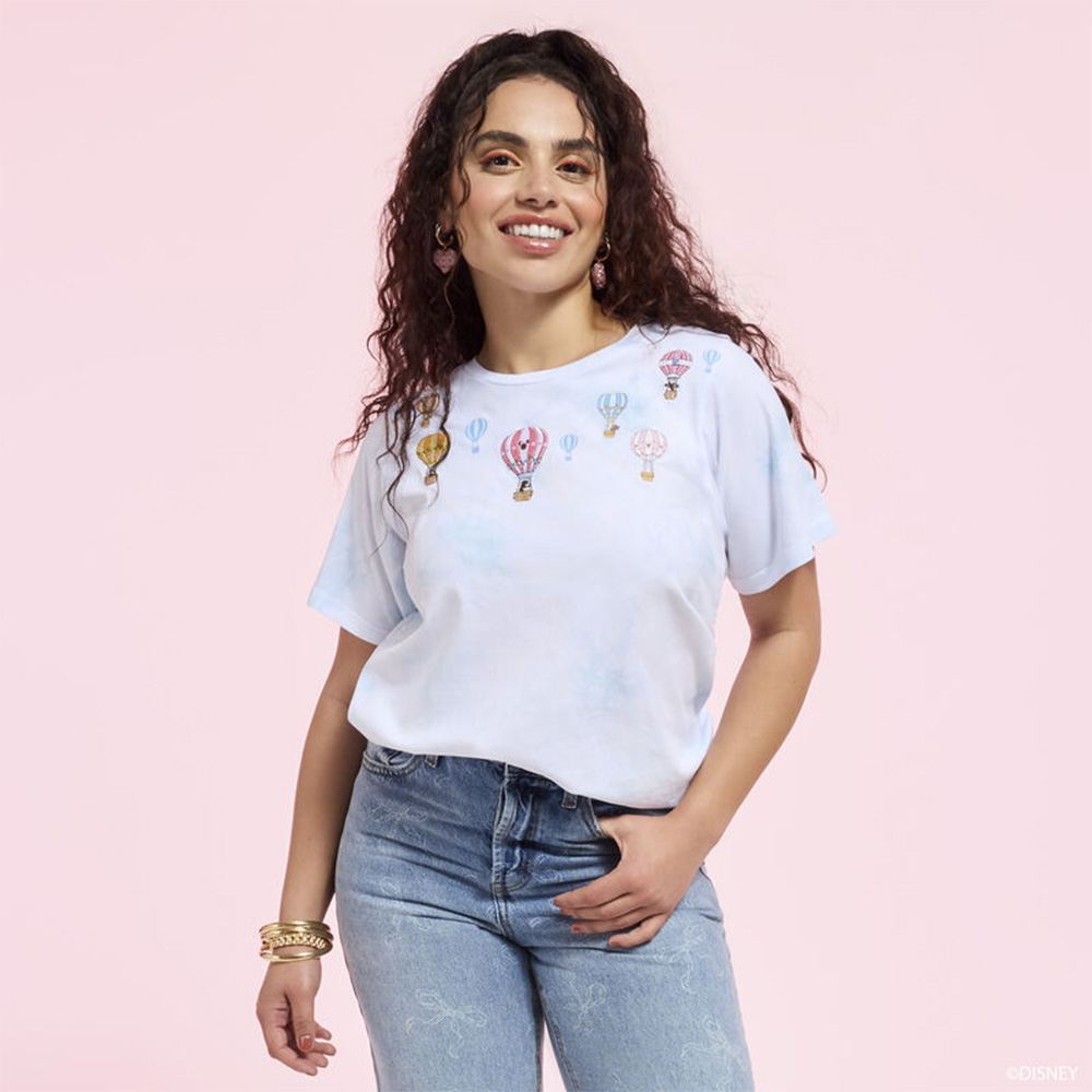 Pink background with model wearing Loungefly Disney Balloon tee