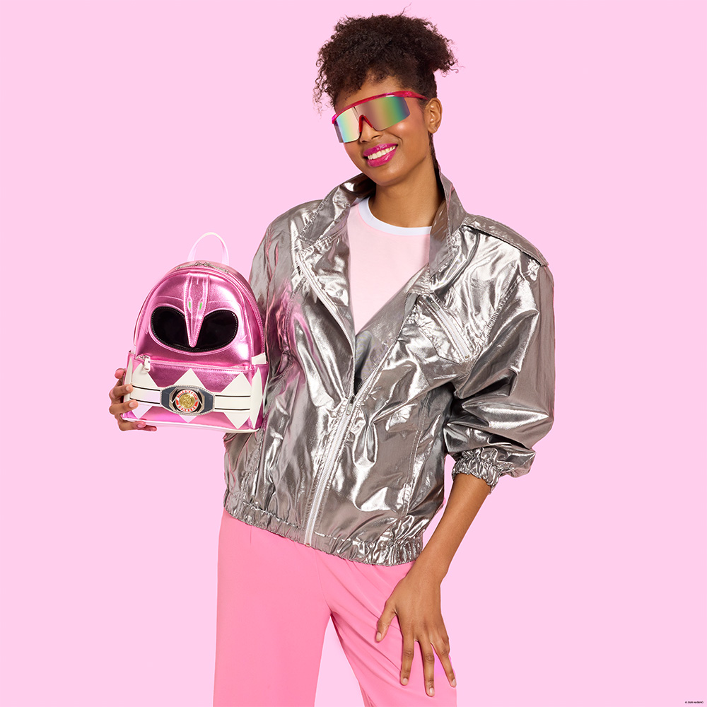 Pink background with model showcasing Loungefly Power Rangers backpack