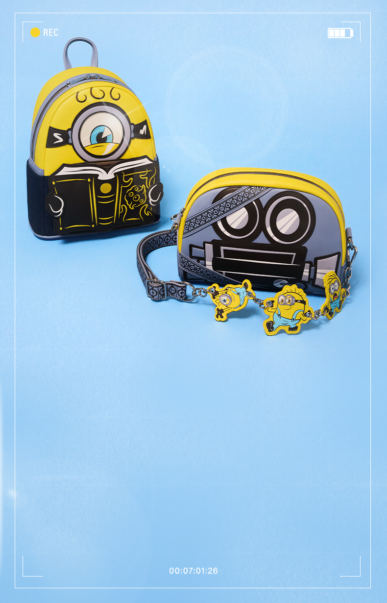Loungefly Minions mini backpack and matching crossbody bag displayed on a soft blue gradient background with a camcorder recording-style frame overlay.
