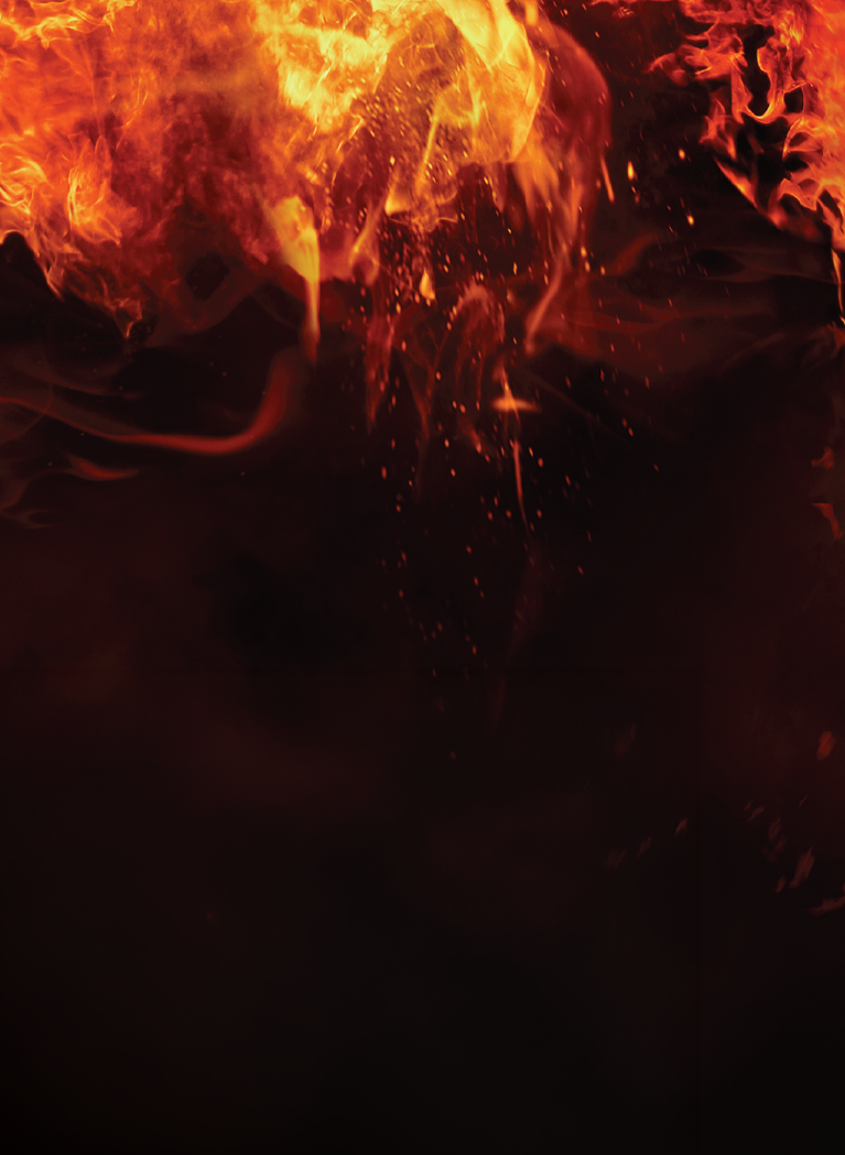 Fiery red and orange flames with glowing embers against a dark black background.