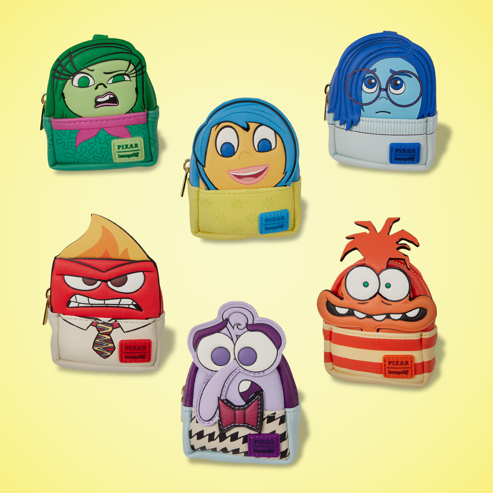 Yellow background featuring Loungefly Inside Out Mystery Bag Charms