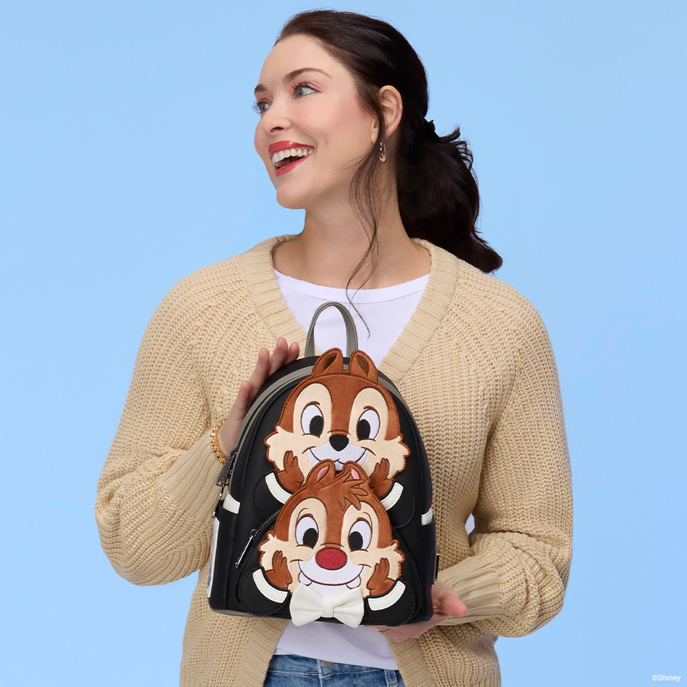 Blue background with model showcasing Loungefly Disney Chip 'n' Dale mini backpack