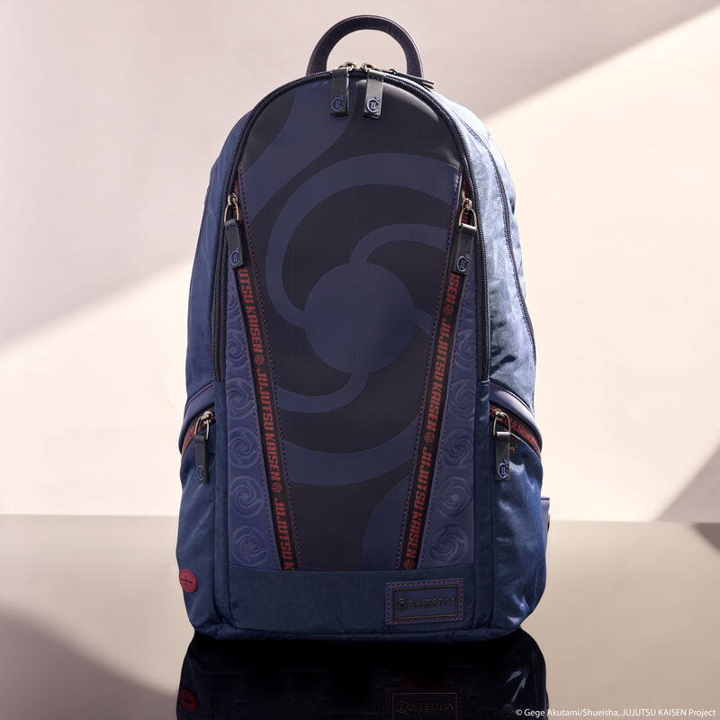 Loungefly COLLECTIV JUJUTSU KAISEN The GAMR full size backpack featuring subtle red details against a blue background. The bag sits against a white and grey background.