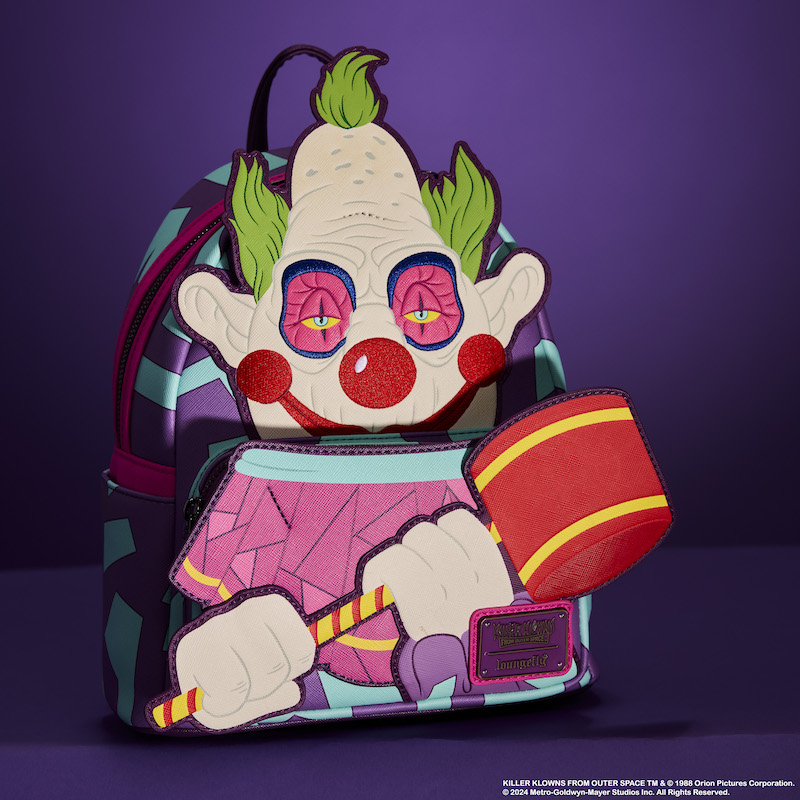 Loungefly mini backpack featuring Jumbo from Killer Klowns from Outer Space holding a mallet. It sits against a purple background. 