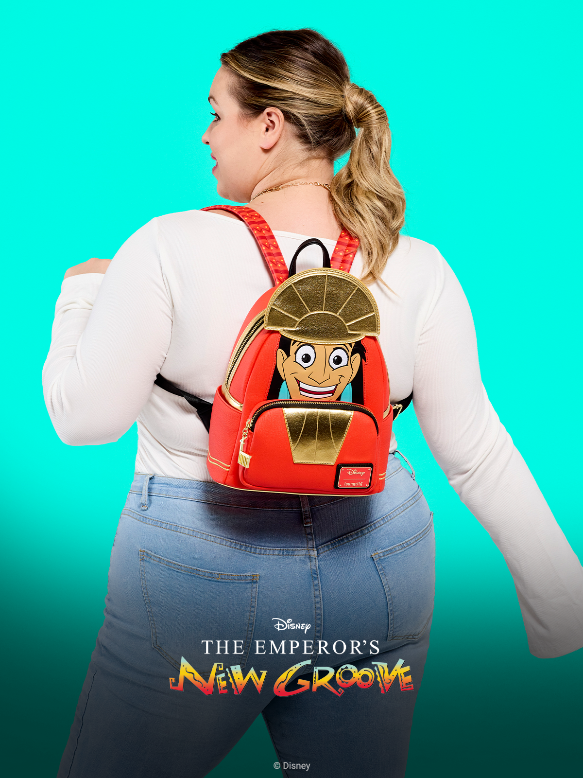 Obnoxiously bright Teal background with model showcasing Loungefly Disney Emperor's New Groove Mini Backpack