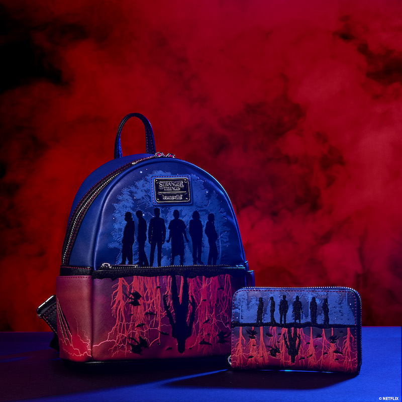 Red and blue Stranger Things mini backpack and wallet featuring the silhouettes of the characters from Stranger Things with Vecna below them in the Upside Down against a blue and red background.