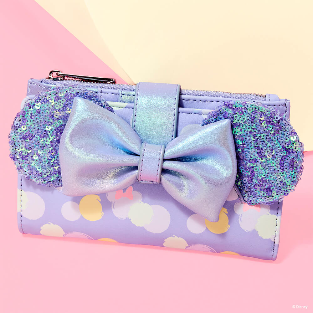 Yellow Pink background featuring WDWA3422 - Minnie Mouse Exclusive Iridescent All-Over Print Sequin Ear Flap Wallet