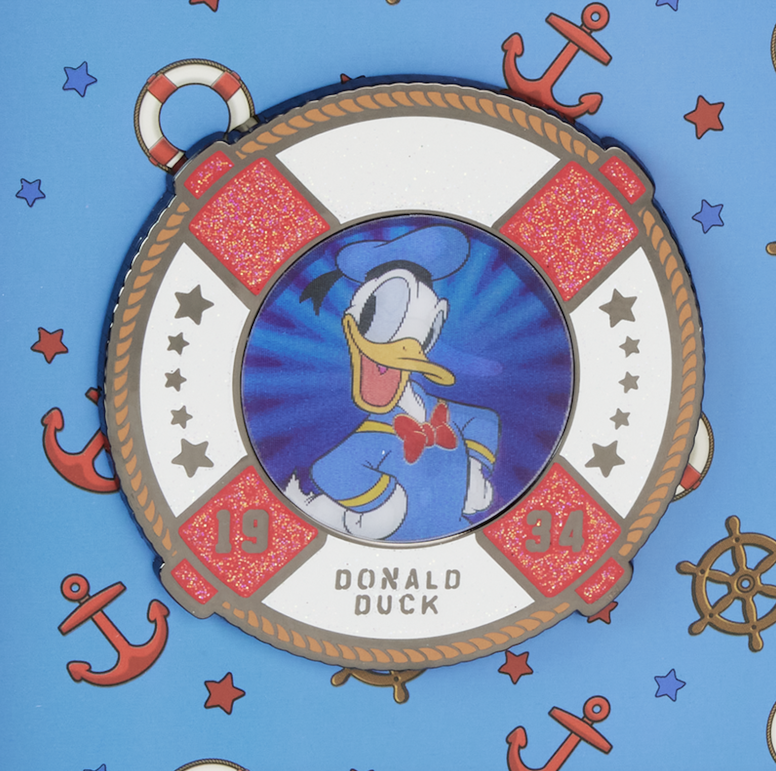 3" lenticular pin featuring Donald Duck within a life preserver ring 