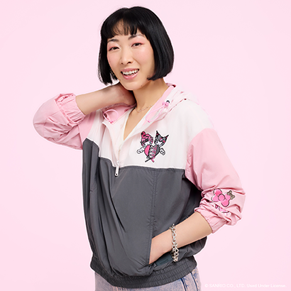 Pink background with model showcasing Lougnefly Sanrio Kurmoi and My Melody Windbreaker