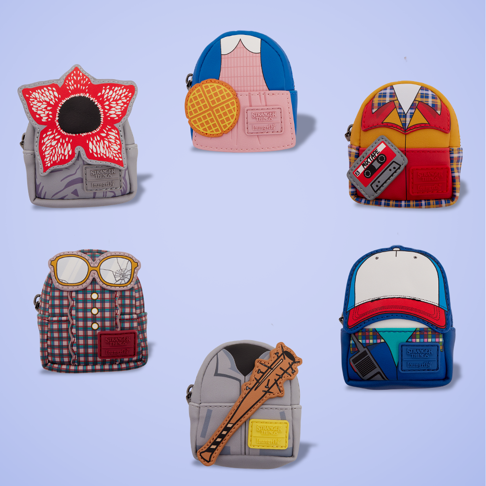 Light Purple background with Loungefly Stranger Things mystery mini backpack bag charms
