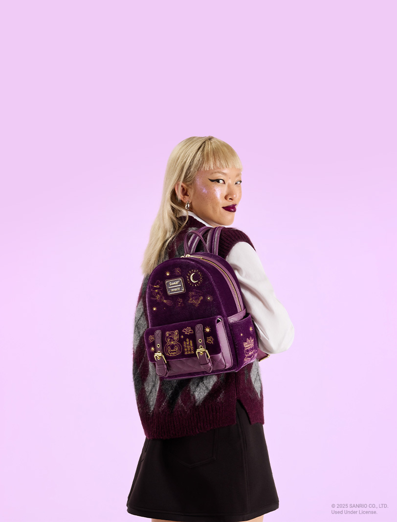 Purple product background with model showcasing Loungefly August Sanrio Halloween mini backpack