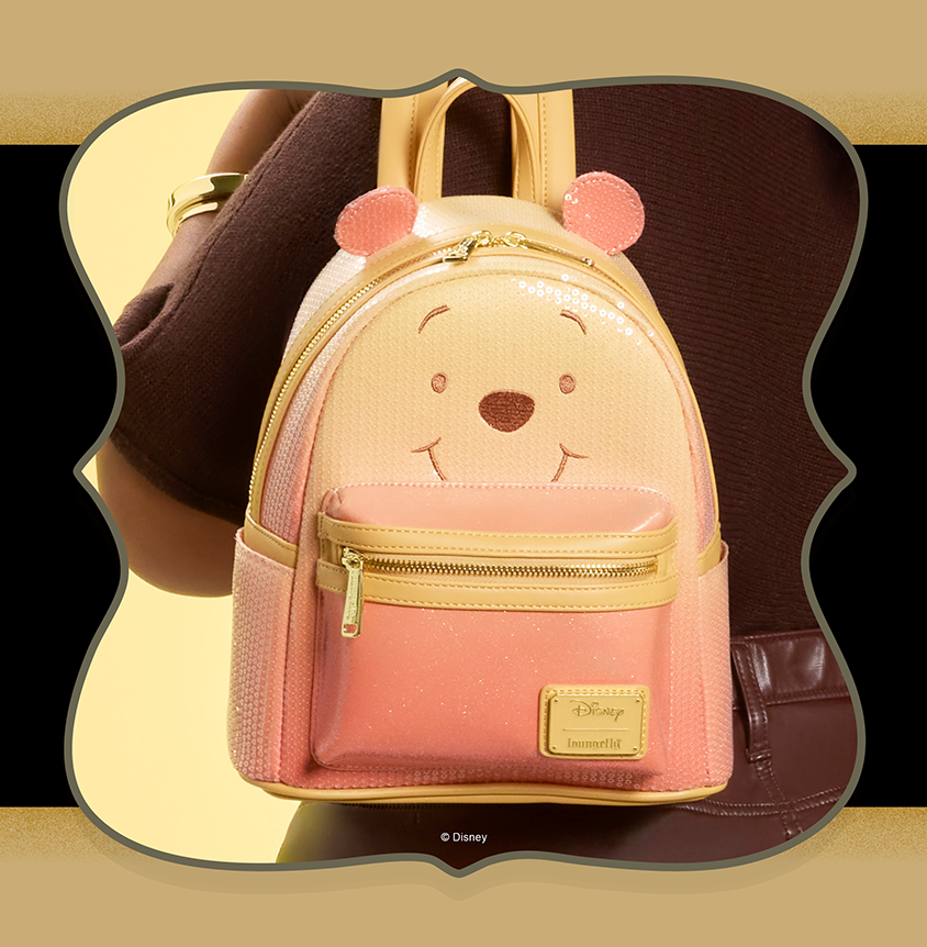 Green background with model showcasing Loungefly Wicked: For Good I Feel Wicked Crossbody Bag