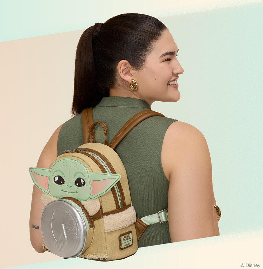 Pastel background with model showcasing Loungefly Star Wars Mandalorian Grogu mini backpack
