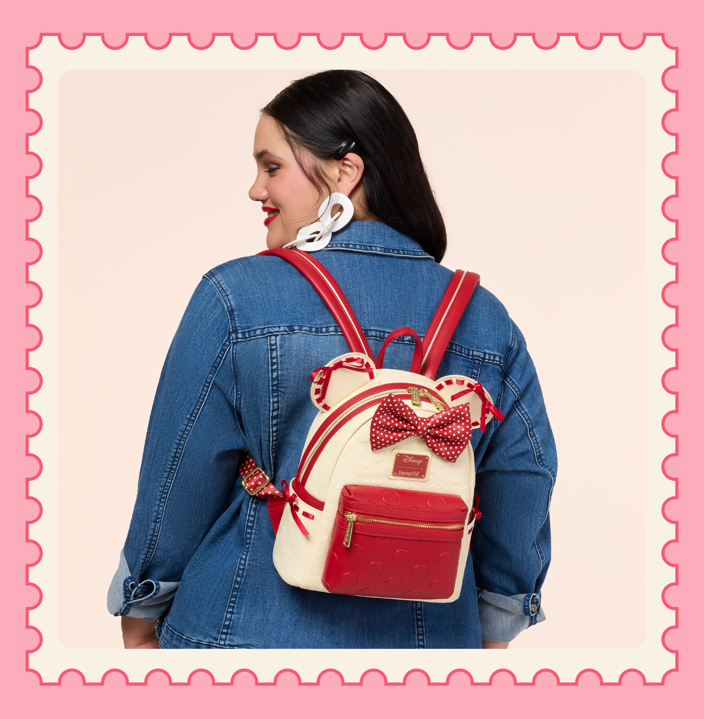 Pink background with model showcasing Loungefly Disney Minnie Rocks the Dots mini backpack