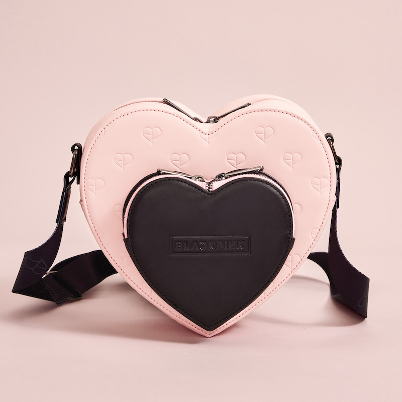 Image of our Loungefly BLACKPINK Crossbody against a pink background