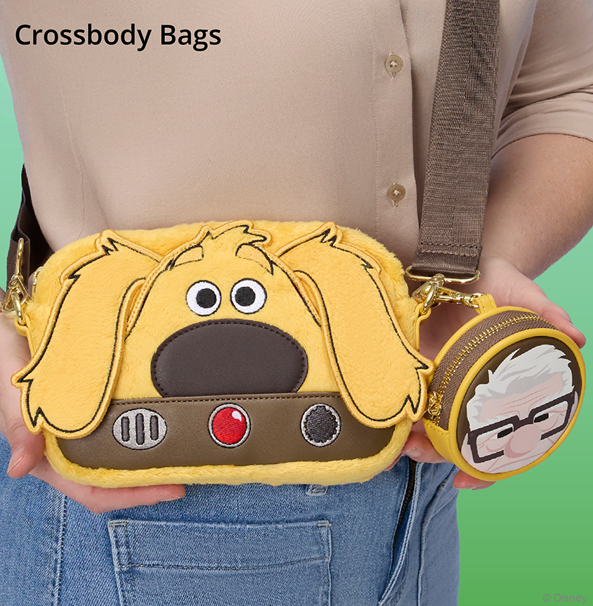 Green background with model holding Loungefly Pixar Dogs Doug crossbody bag