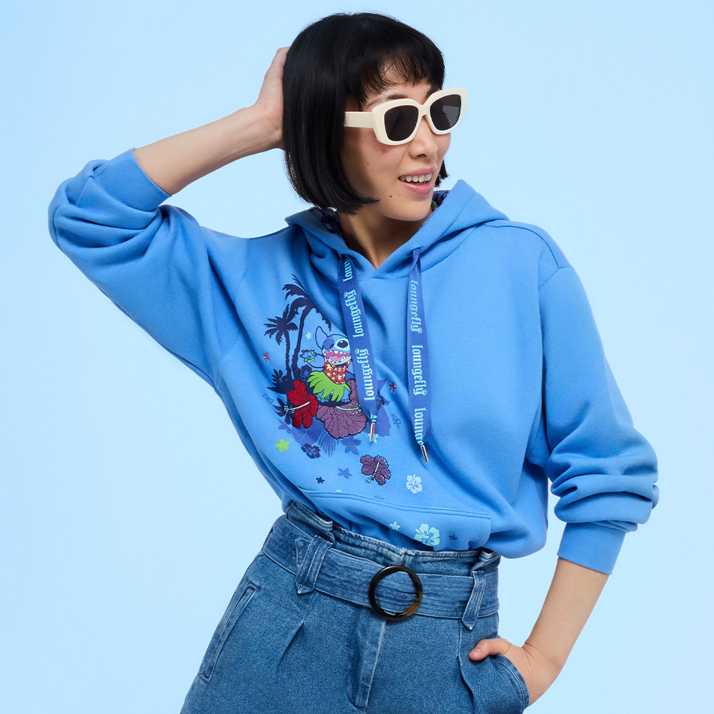 Blue background with model showcasing Loungefly San Diego Comic Con Disney Lilo & Stitch apparel