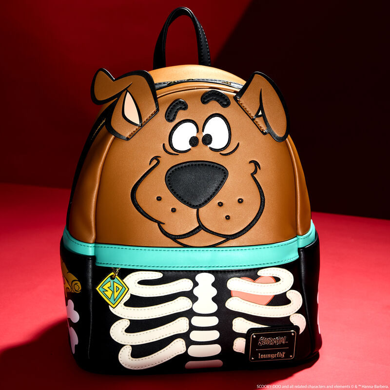 Loungefly Scooby-Doo mini backpack featuring Scooby-Doo dressed as a skeleton. It sits against a dark red background.