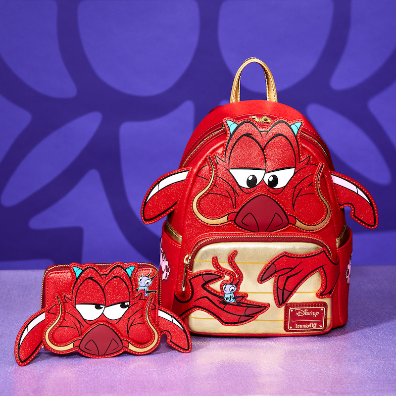 Purple background featuring the red, glittery cosplay backpack and wallet of Mushu with Cri-Kee from Disney's Mulan 