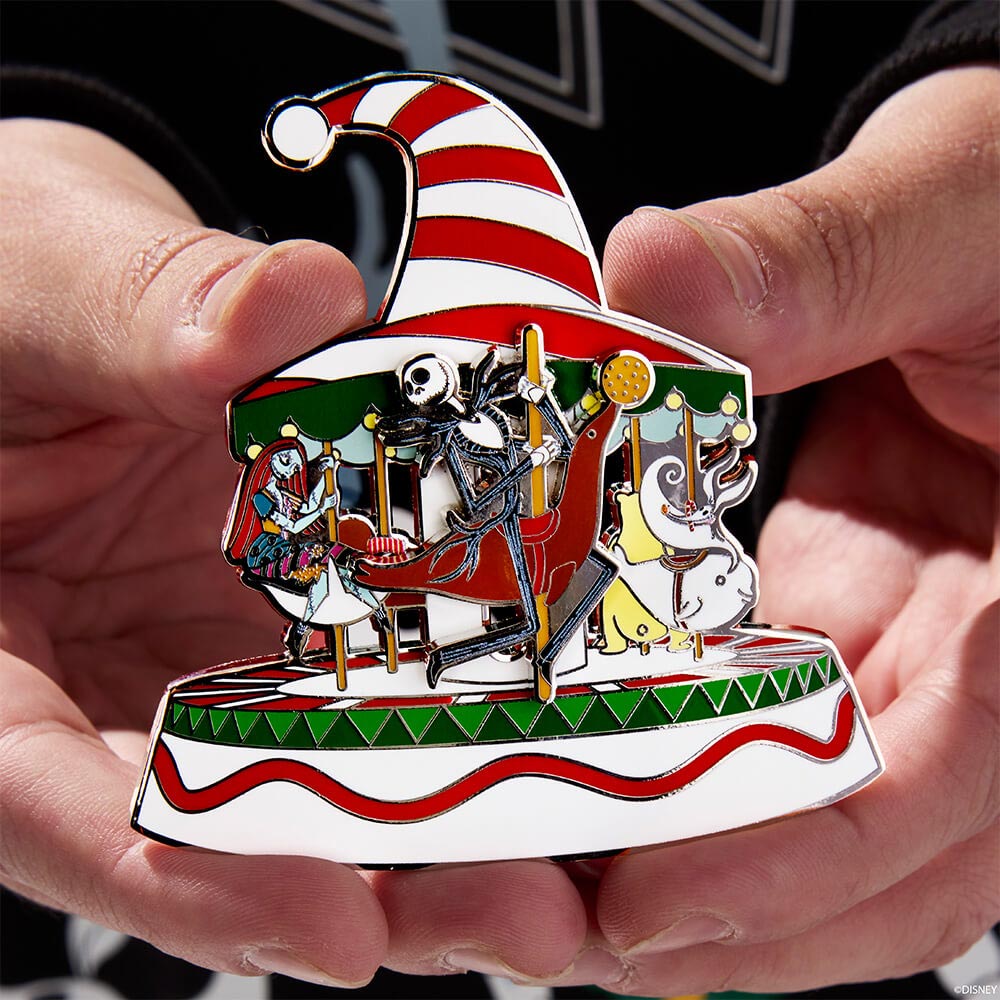 Hands holding Disney The Nightmare Before Christmas Candy Cane Carousel 3" Collector Box Sliding Pin