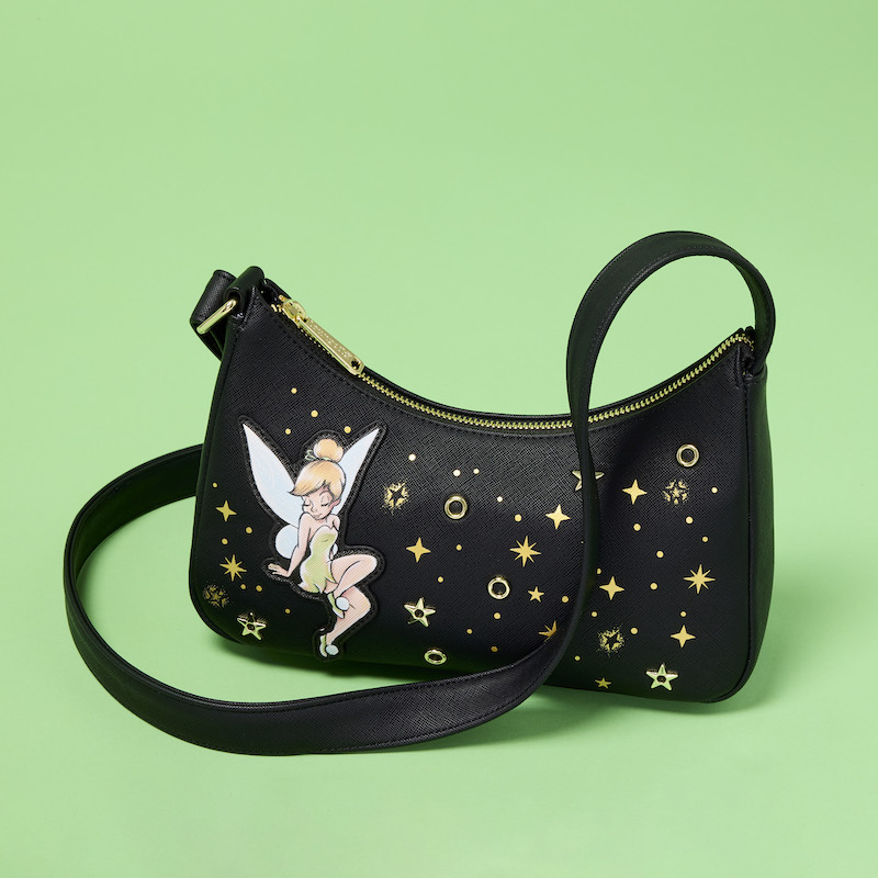 Black Loungefly Disney Tinker Bell crossbody bag sitting against a green background