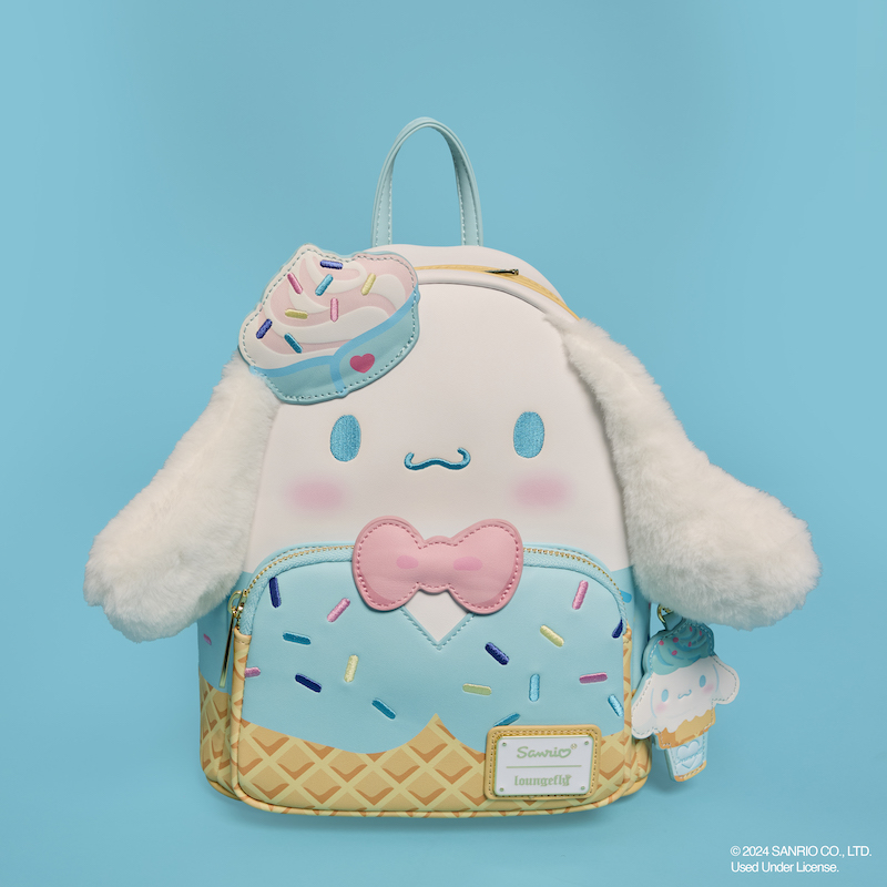 Mini backpack featuring Cinnamoroll in an ice cream-themed outfit with plush 3D ears. It stands against a light blue background.