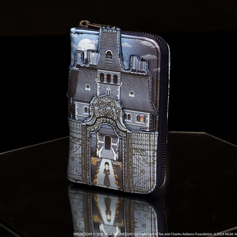 Loungefly zip around wallet featuring Nevermore Academy in appliqué detail. The wallet sits against a dark background. 