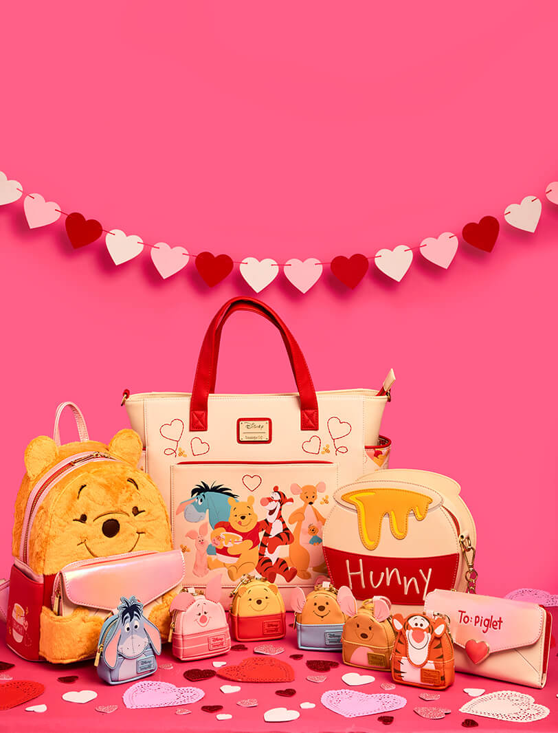 Pink Red product background with heart-shaped confetti surface featuring Loungefly January Disney Winnie the Pooh Love Letter collection