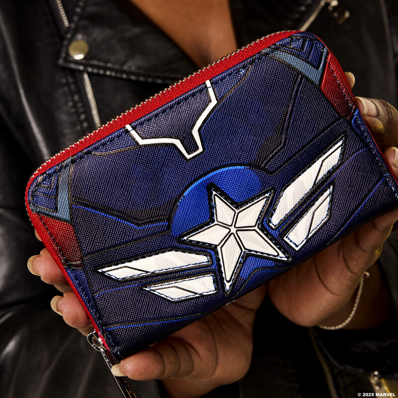 Close-up shot of a woman holding the Loungefly Captain America: Brave New World Zip Around Wallet, which features details inspired by Sam Wilson's Captain America uniform. 