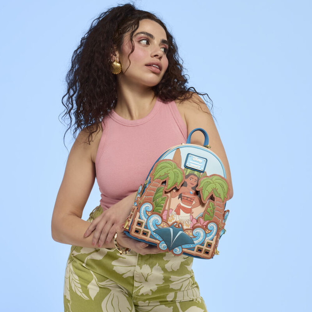 Blue background with model showcasing Loungefly Disney Moana of Motunui Mini Backpack