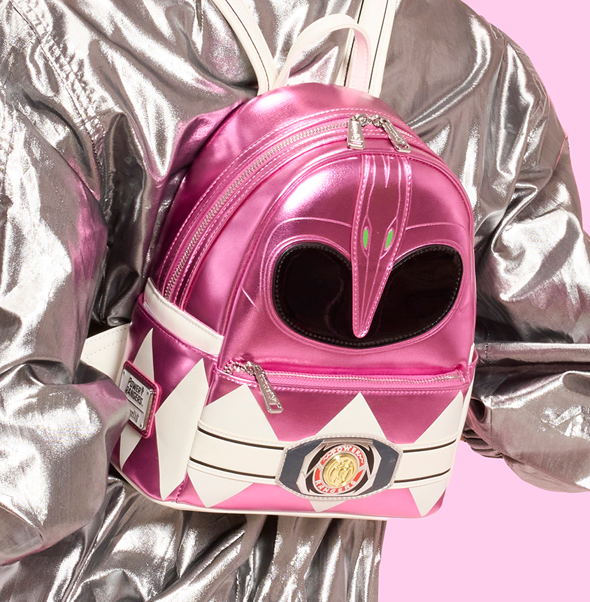 Pink background with model showcasing Loungefly Power Rangers Mini Backpack