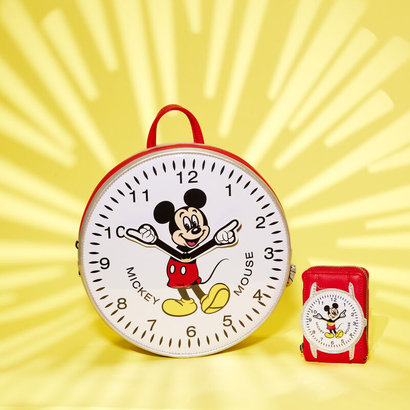 Image of our Mickey Mouse Vintage Watch Mini Backpack and Wallet against a yellow background