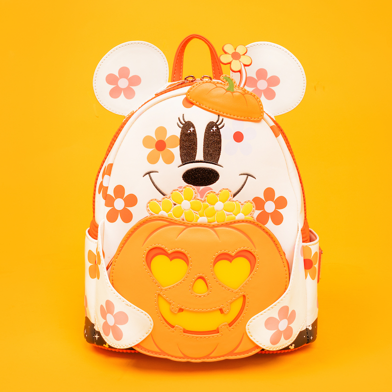 Loungefly Minnie Mouse Floral Ghost Mini Backpack featuring ghost Minnie Mouse holding a jack-o'-lantern sitting against a light orange background