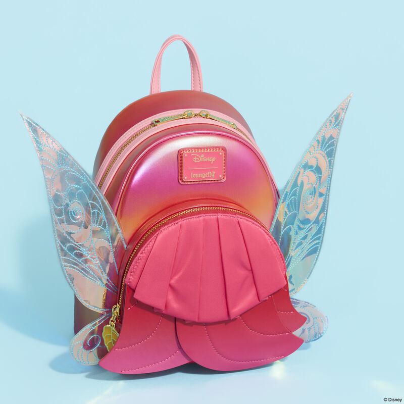 Loungefly Disney Fairies Rosetta mini backpack sitting against a blue background. 