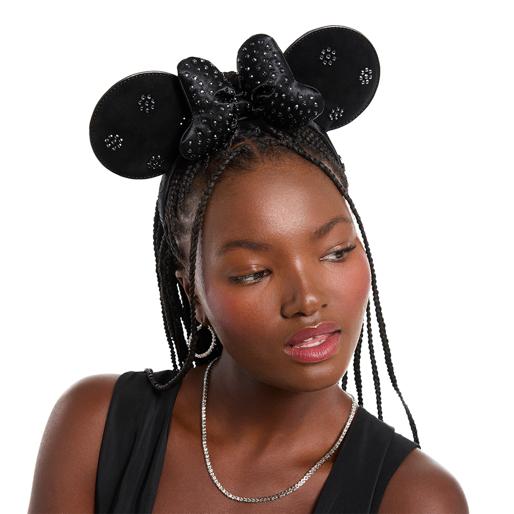 White background with model wearing Loungefly Disney Minnie Mouse Swarovski Ears