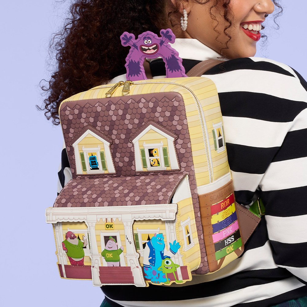 Light Purple background with model wearing Loungefly Disney Pixar Monsters University backpack
