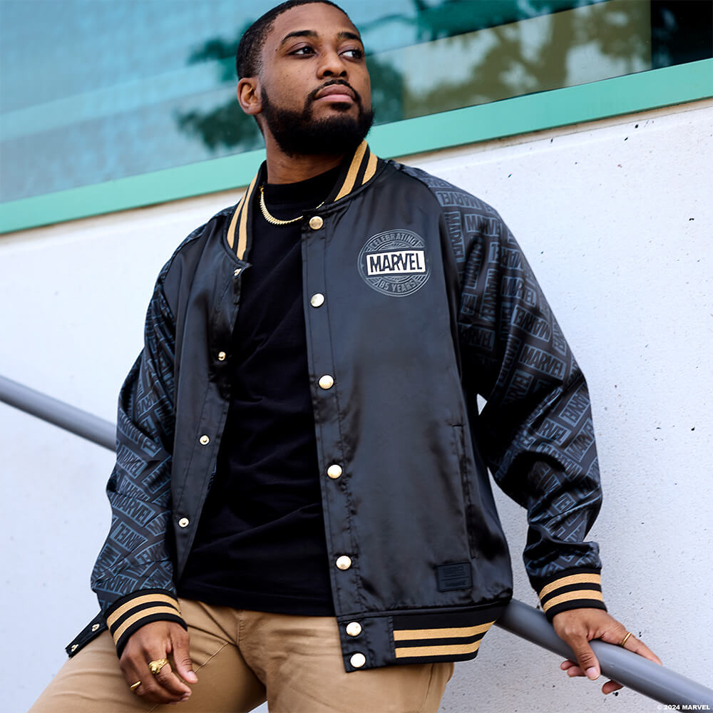 Male model wearing Marvel 85th Anniversary Unisex Bomber Jacket