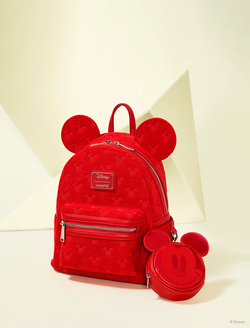 Off-white background featuring May Loungefly Disney Mickey Mouse Plush collection