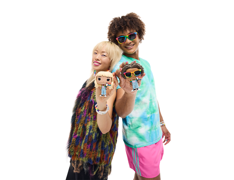 Models wearing colorful outfits, holding custom Pop! Yourself figures with Pride accessories 