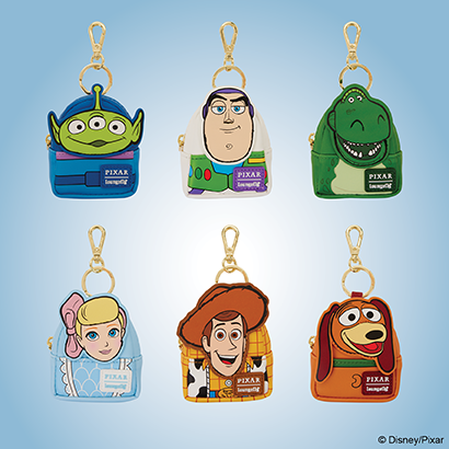 Blue background featuring Loungefly Pixar Toy Story Mystery Mini Backpack charms