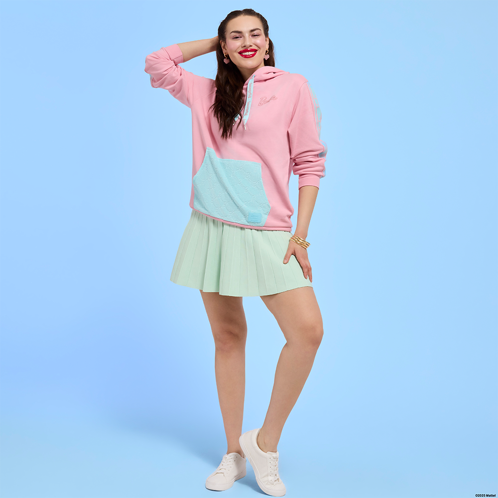 Blue background with model showcasing Loungefly Mattel Barbie apparel