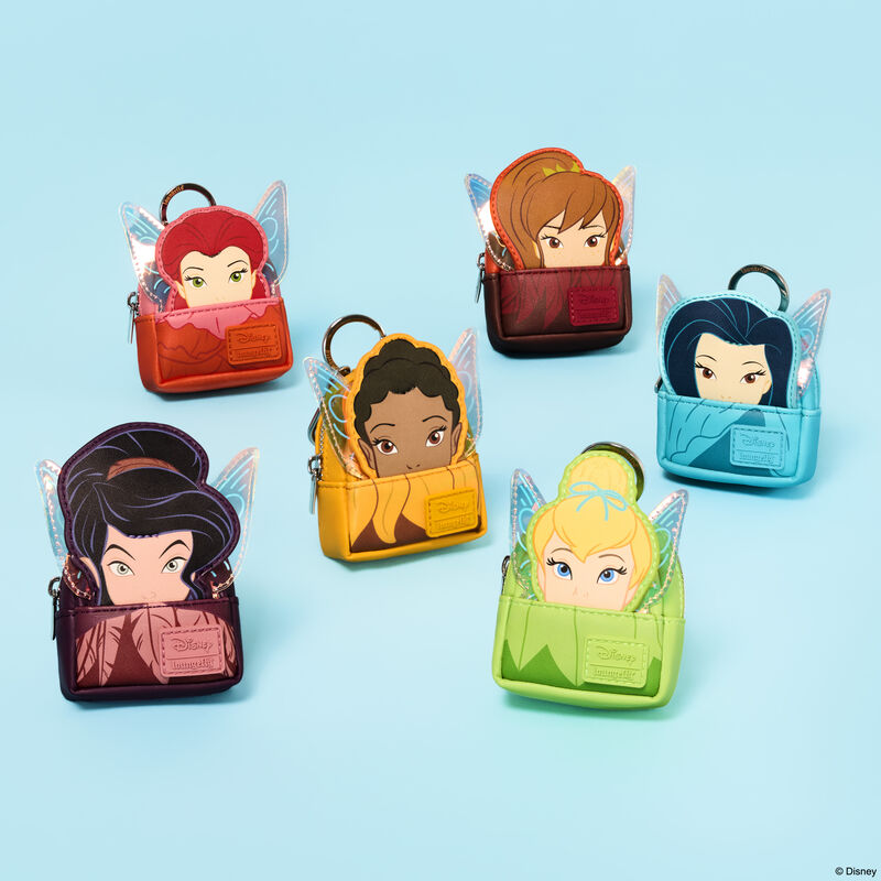 Each of the Loungefly Disney Fairies cosplay mystery mini backpack keychain charms sitting against a blue background. 