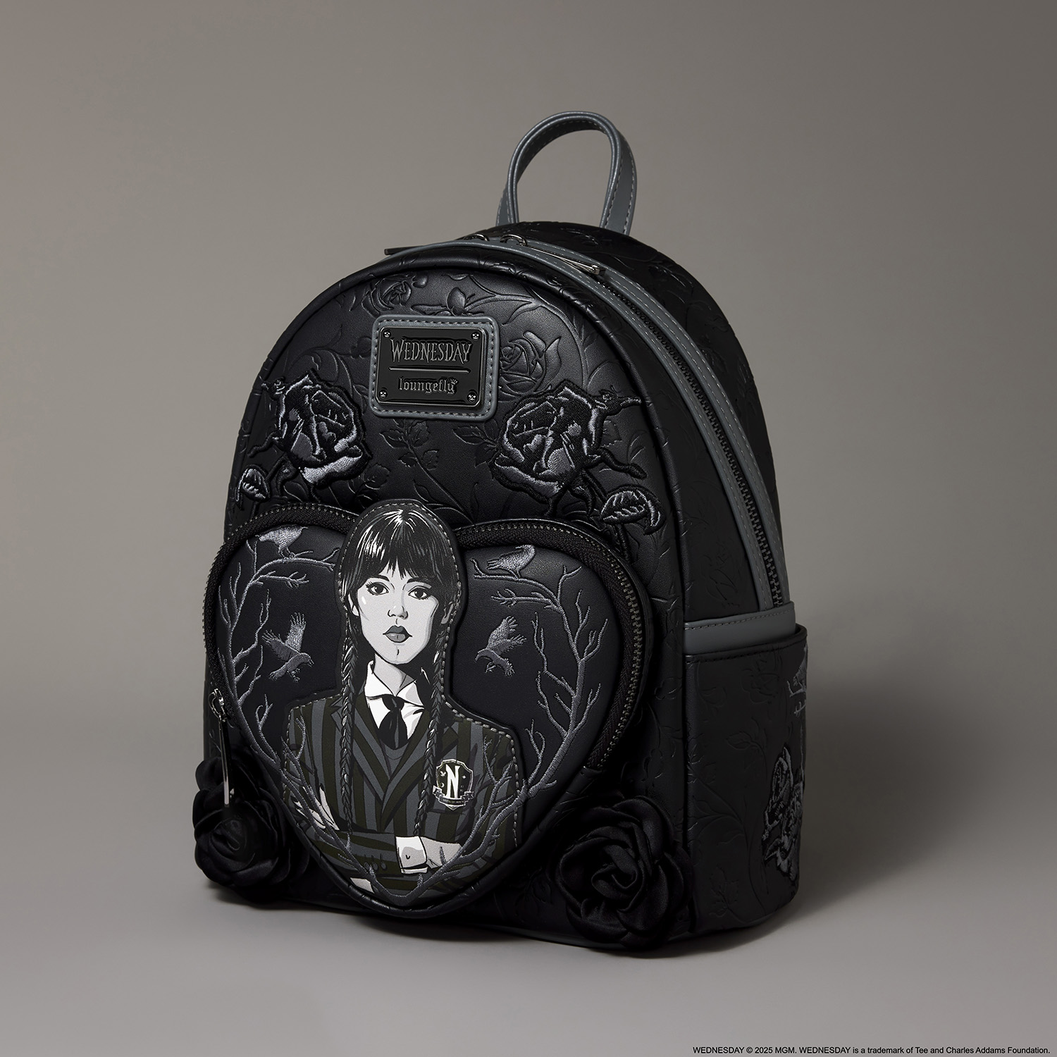 addams family mini backpack Wednesday Nevermore Academy Castle Glow Loungefly this backpack helps carry all your small essentials from your phone to keys to wallet Wednesday The Addams Family Nevermore